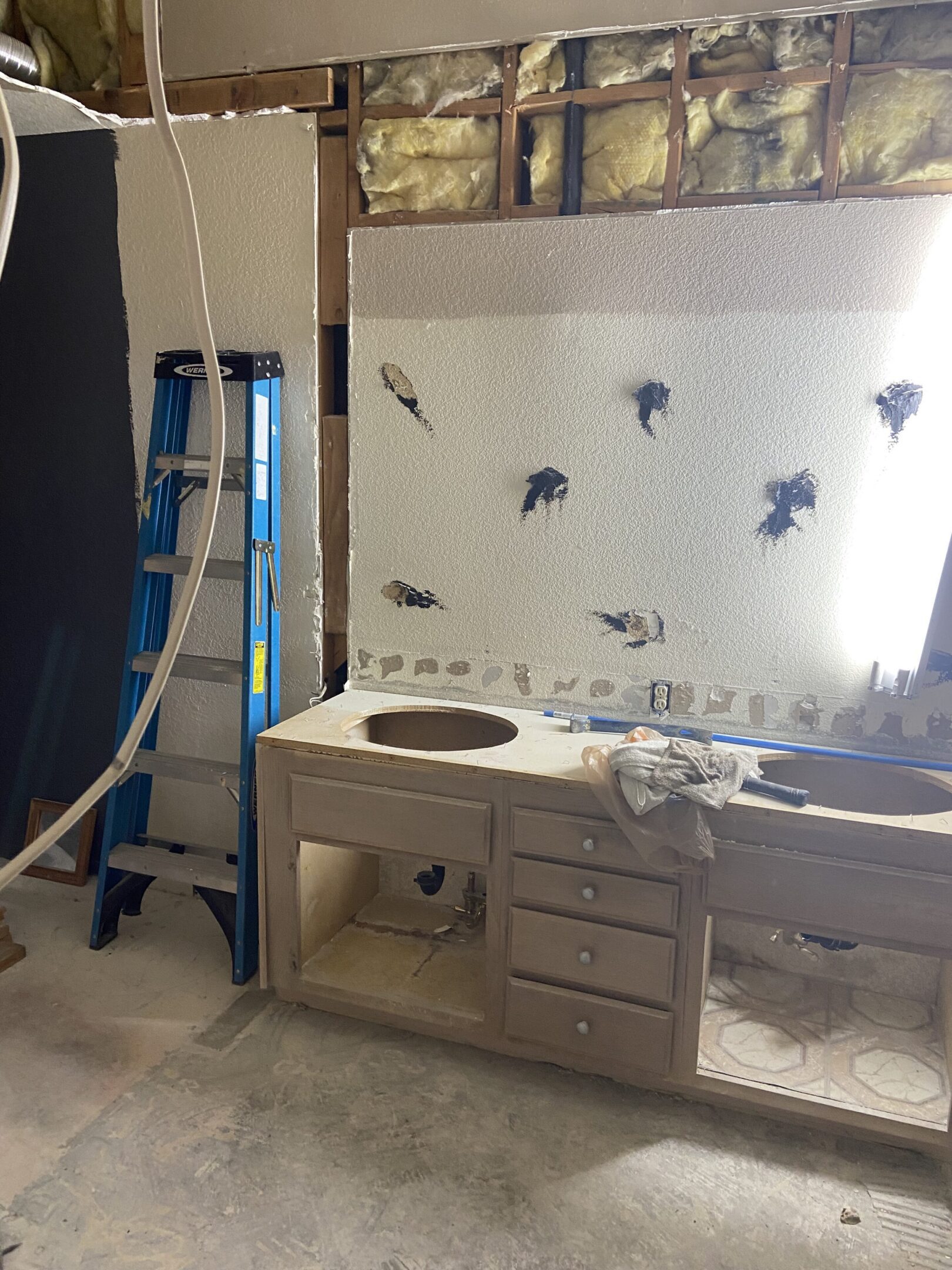 Bathroom under renovation with double vanity