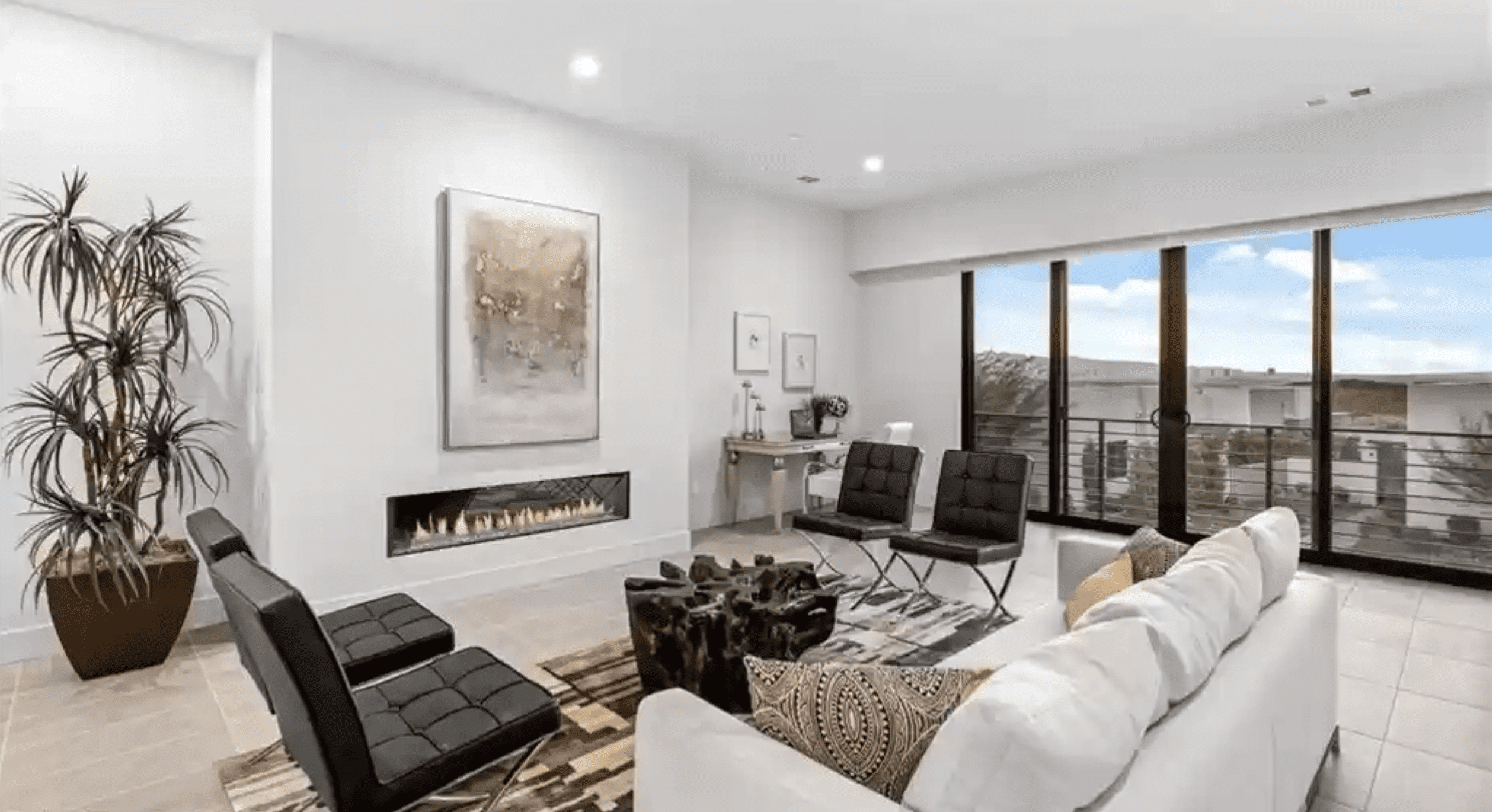 Modern living room with fireplace and balcony